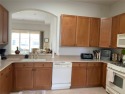 PRICE ADJUSTMENT! Pet friendly association!  Cheery and bright for sale in Sun City Center Florida Hillsborough County County on GolfHomes.com