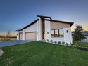 This newly constructed contemporary residence in Tuscan Village for sale in Horseshoe Bay Texas Llano County County on GolfHomes.com