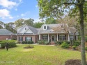 This beautiful home is nestled on a completely landscaped wooded for sale in Supply North Carolina Brunswick County County on GolfHomes.com