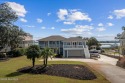 Welcome to your dream home--an exquisite Intercoastal Waterway for sale in Sunset Beach North Carolina Brunswick County County on GolfHomes.com