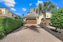 NEW PHOTOS and enhanced decor! Stunning panoramic lake & golf for sale in Naples Florida Collier County County on GolfHomes.com