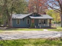 This brilliantly restored home delivers comfort, charm, and for sale in Charlevoix Michigan Charlevoix County County on GolfHomes.com