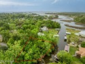 Waterfront lot on canal of bayou in the infamous Gulf Hills for sale in Ocean Springs Mississippi Jackson County County on GolfHomes.com