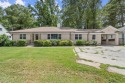 Charming 4-sided brick ranch with a basement in Cascade Heights! for sale in Atlanta Georgia Fulton County County on GolfHomes.com