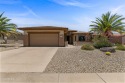 Highly upgraded Sun City Grand home with split floor plan & for sale in Surprise Arizona Maricopa County County on GolfHomes.com