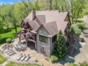 Indian Lakefront!  Largest compound on this 500 acre all-sport for sale in Eau Claire Michigan Cass County County on GolfHomes.com