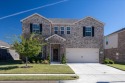 Located in Travis Ranch just minutes from Lake Ray Hubbard for sale in Forney Texas Rockwall County County on GolfHomes.com