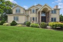 Welcome to 4 Nadia Court, a custom-designed  5 bedroom, 4.5 bath for sale in Smithtown New York Suffolk County County on GolfHomes.com