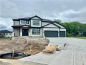 Big and beautiful Niko plan by Prieb Homes is situated next to for sale in Shawnee Kansas Johnson County County on GolfHomes.com