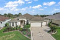 Located on the ninth hole of the Allamanda championship course for sale in The Villages Florida Sumter County County on GolfHomes.com