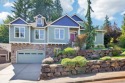 Well-maintained craftsman perched above the road in sought after for sale in Gresham Oregon Multnomah County County on GolfHomes.com