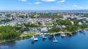 CUSTOM LAKE FRONT HOME WITH PRIVATE DOCK, BOATHOUSE FEATURING 6K for sale in Panama City Beach Florida Bay County County on GolfHomes.com