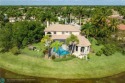 Tropical Paradise with Grand Presence on peninsula with over 200 for sale in Weston Florida Broward County County on GolfHomes.com