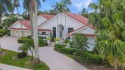 Gorgeous sun-filled custom home with 16' soaring ceilings for sale in Boca Raton Florida Palm Beach County County on GolfHomes.com