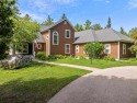 Custom designed home in a private neighborhood Stonebridge for sale in Charlevoix Michigan Charlevoix County County on GolfHomes.com