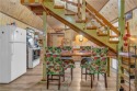 Enjoy lakeside living with this charming and move-in ready cabin for sale in Mound City Kansas Linn County County on GolfHomes.com