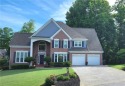 GORGEOUS HOME in sought after Brookstone with an awesome SWIM for sale in Acworth Georgia Cobb County County on GolfHomes.com
