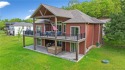 Welcome to this 6-bedroom, 4-full bath home, perfectly for sale in Lake Ozark Missouri Camden County County on GolfHomes.com