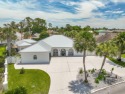 Canal-front home in Bay Point gated community. Gulf Access for sale in Panama City Beach Florida Bay County County on GolfHomes.com