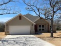LIVE THE DREAM WITH NO HOA! Rural Lake Bridgeport Community is for sale in Runaway Bay Texas Wise County County on GolfHomes.com