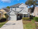 Welcome home to this stunning Victorian-style villa, perfectly for sale in Winter Springs Florida Seminole County County on GolfHomes.com