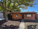 This home is conveniently located in the UNM area. Go Lobos! for sale in Albuquerque New Mexico Bernalillo County County on GolfHomes.com