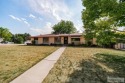 Nestled on a spacious 0.43-acre corner lot along the fairways of for sale in Pocatello Idaho Bannock County County on GolfHomes.com