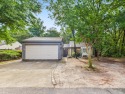 Secluded and beautifully updated, this charming 2-bedroom for sale in Niceville Florida Okaloosa County County on GolfHomes.com