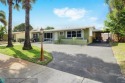 This charming 3-bedroom, 2-bathroom home offers a spacious for sale in Pompano Beach Florida Broward County County on GolfHomes.com