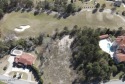 Nestled on a serene golf course, this spacious 0.66-acre lot for sale in Macon Georgia Bibb County County on GolfHomes.com