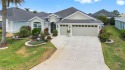 Beautiful 3/2  ZINNIA model home in the Village of Gilchrist for sale in The Villages Florida Sumter County County on GolfHomes.com