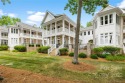 This elegant townhome showcases breathtaking sunset views over for sale in New London North Carolina Montgomery County County on GolfHomes.com