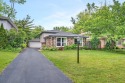 At first glance, this brick and sided split-level home may for sale in Homewood Illinois Cook County County on GolfHomes.com