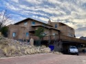 This stunning 3443 SF, two-story Rastra Southwestern home offers for sale in Socorro New Mexico Socorro County County on GolfHomes.com