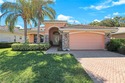 This home includes a $50,000 golf membership--yours to enjoy for sale in Bonita Springs Florida Lee County County on GolfHomes.com