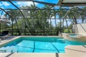 Fall in love with your private piece of paradise with views of for sale in Estero Florida Lee County County on GolfHomes.com