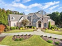 Stunning elegance overlooking the 14th green in gated White for sale in Milton Georgia Fulton County County on GolfHomes.com