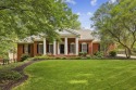 Located in the desirable Glastonberry swim/tennis community for sale in Johns Creek Georgia Fulton County County on GolfHomes.com