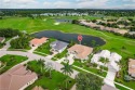 Discover your dream home in the exclusive Lely Island Estates, a for sale in Naples Florida Collier County County on GolfHomes.com