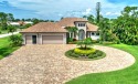 Treat yourself to this extraordinary custom estate home with for sale in Punta Gorda Florida Charlotte County County on GolfHomes.com