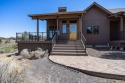 Beautiful four-bedroom cabin with contemporary finishes and a for sale in Powell Butte Oregon Crook County County on GolfHomes.com