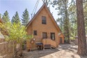 Nestled on a spacious 5,000 square foot lot, this 2-bedroom for sale in Big Bear City California San Bernardino County County on GolfHomes.com