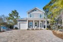 Discover the perfect blend of coastal comfort, modern style, and for sale in Inlet Beach Florida Walton County County on GolfHomes.com