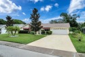 Lakefront Living in Beacon Woods Village with no flood insurance for sale in Hudson Florida Pasco County County on GolfHomes.com