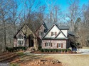 This beautiful house is nestled on 1.7 acres in the coveted for sale in Newnan Georgia Coweta County County on GolfHomes.com