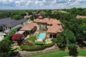 Meticulously maintained Mediterranean-style estate sited on an for sale in Frisco Texas Denton County County on GolfHomes.com