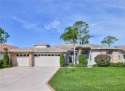 Welcome to this beautifully designed split-living 3-bedroom for sale in Spring Hill Florida Hernando County County on GolfHomes.com