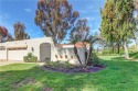 Set at the end of a peaceful cul-de-sac and surrounded by lush for sale in Laguna Woods California Orange County County on GolfHomes.com