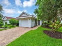 Charming 3-Bedroom Villa with Lakeview in World Tennis Center for sale in Naples Florida Collier County County on GolfHomes.com