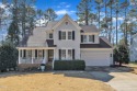 Prestonwood CC home nestled on the green of the 8th hole for sale in Morrisville North Carolina Wake County County on GolfHomes.com